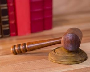 hammer on a table, symbolising the finality of a legal decision